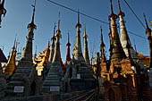 Inle Lake Myanmar. Indein, on the summit of a hill the  Shwe Inn Thein Paya a cluster of hundreds of ancient stupas. Many of them are ruined and overgrown with bushes. 